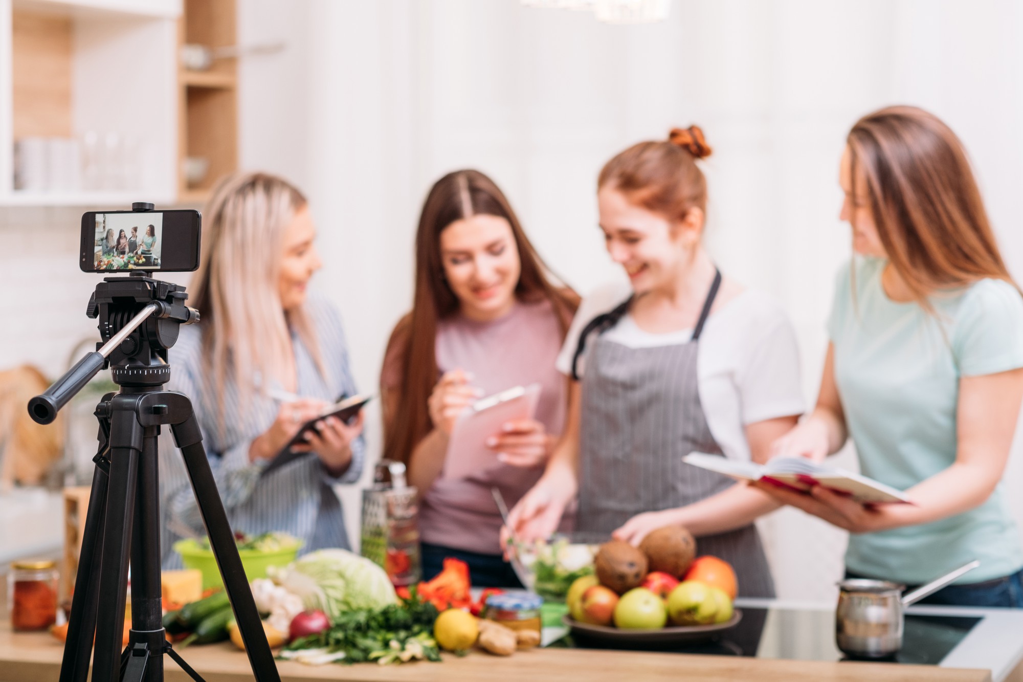Kitchen studio with instructor and students in a class